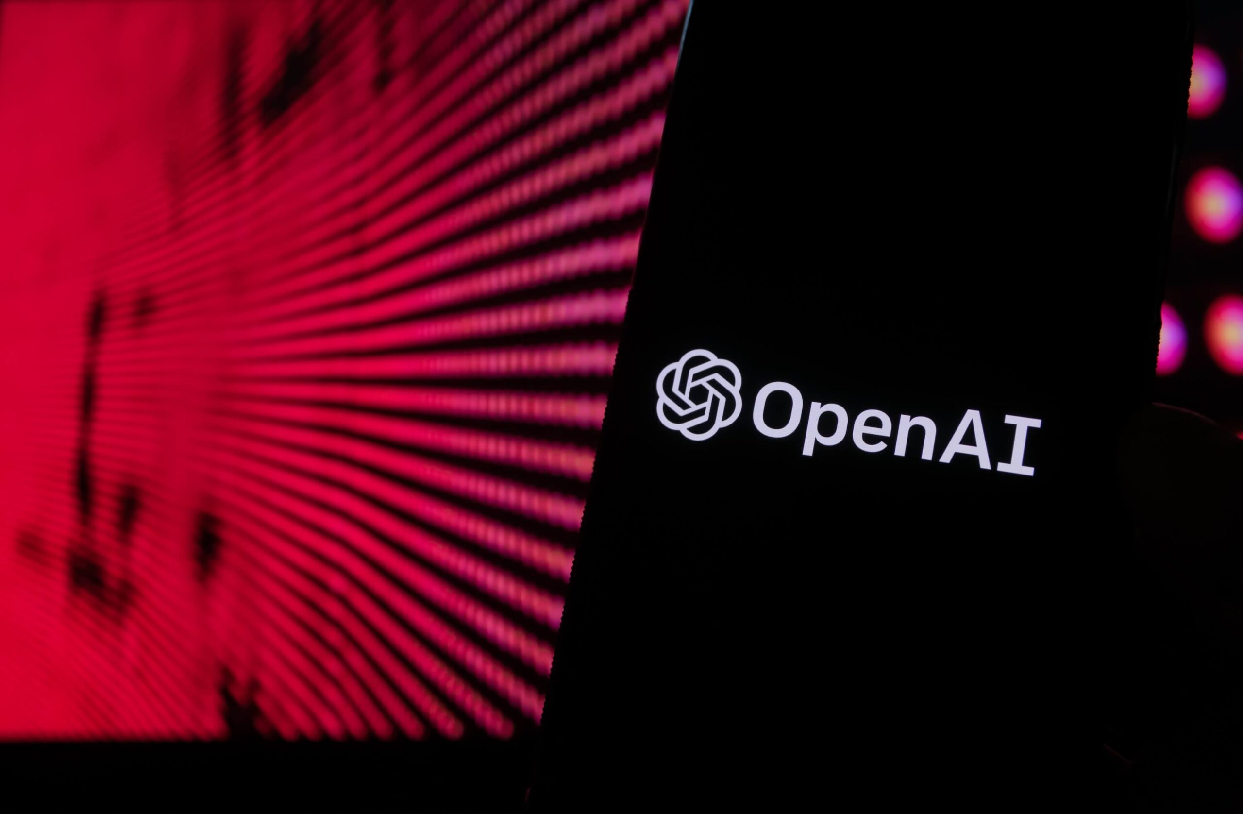 Open AI logo na czerwonym tle