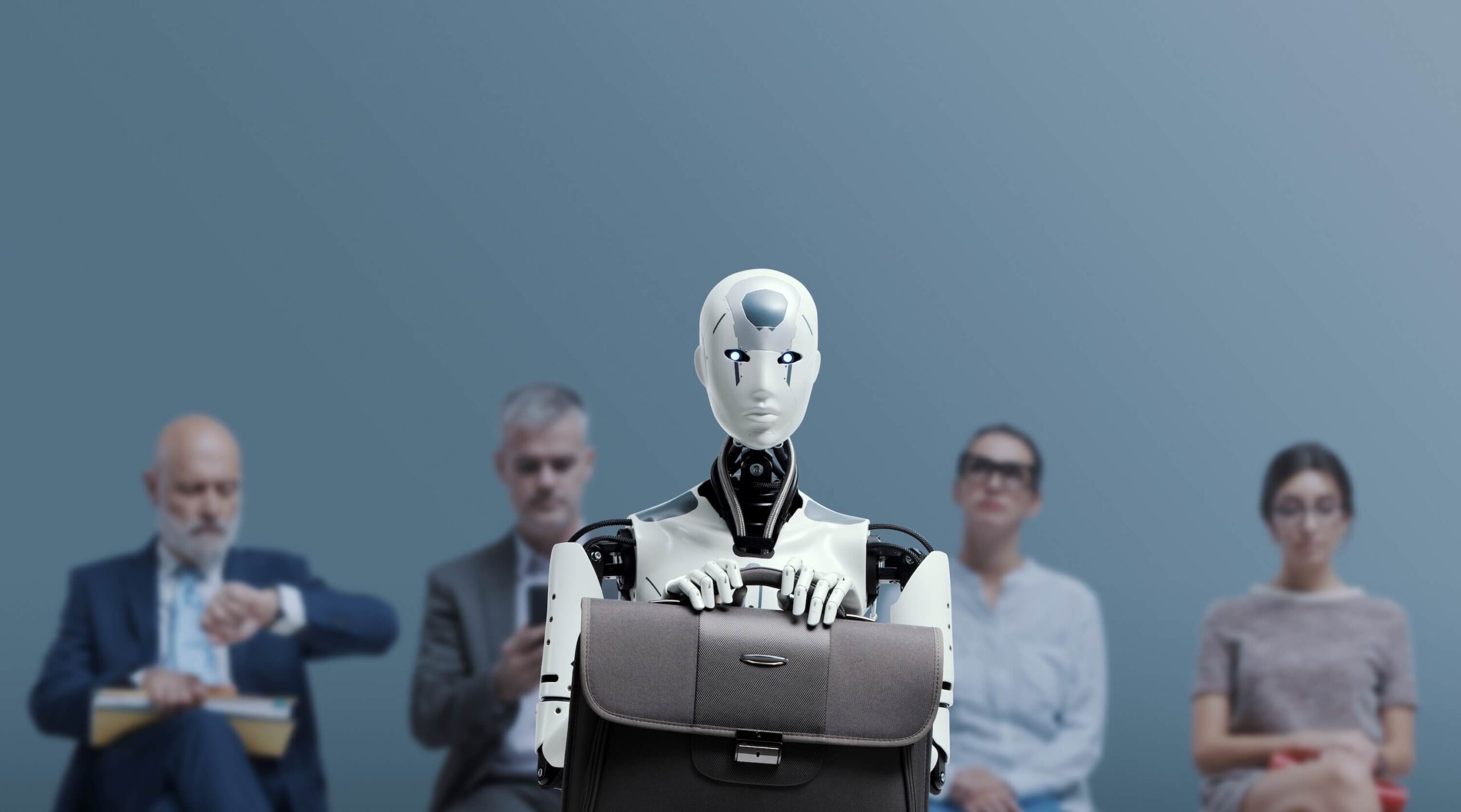 Robot oraz ludzie jako kandydaci do pracy